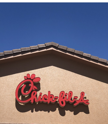 SCS, image of a Chick fil A building exterior against a blue sky 