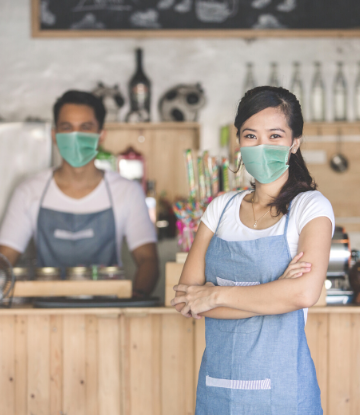 SCS, image of 2 restaurant workers wearing face masks 