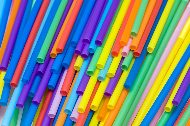 Colorful pile of plastic drinking straws