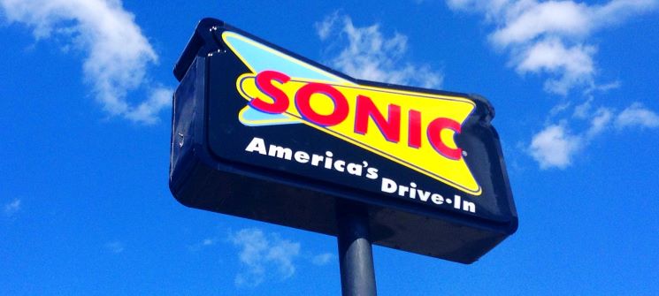 Sonic sign against blue sky