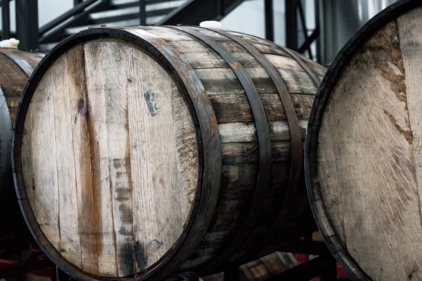 2 brown wooden wine barrels