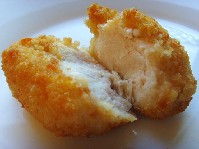 Chicken nugget split in half