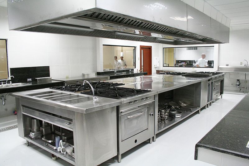 Large stainless steel industrial kitchen.
