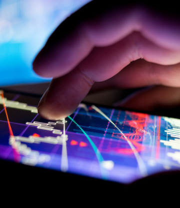 Suply Chain Scene, image of a hand using tablet technology 