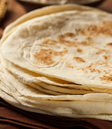 Supply Chain Scene, image of a stack of fresh, flour tortillas 