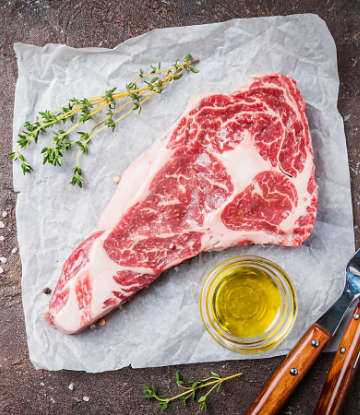 Supply Chain Scene, image of a marbled, high quality raw steak 
