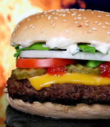 Supply Chain Scene, image of a cooked, delicious, cheeseburger with everything
