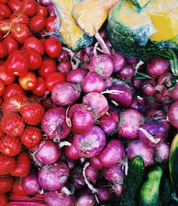 Supply Chain Scene, image of fresh tomatoes and onions 