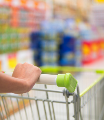 SCS, image of a grocery cart in a grocery store isle 