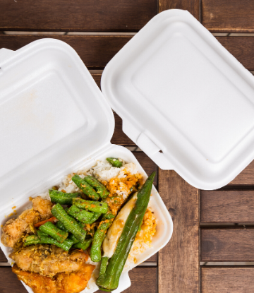 Image of a meal in a polystyrene clam shell package