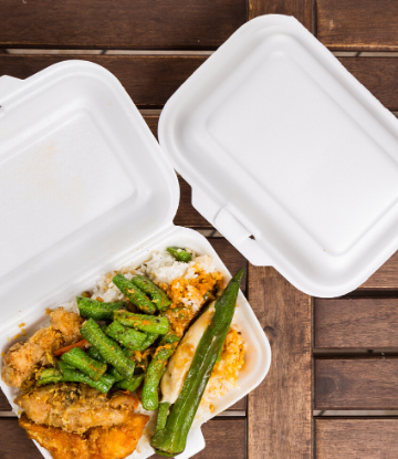 Image of a meal in a polystyrene clam shell package 