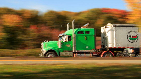 SCS, image of a semi truck driving on the highway