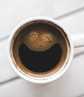 SCS, overhead image of a cup of black coffee 