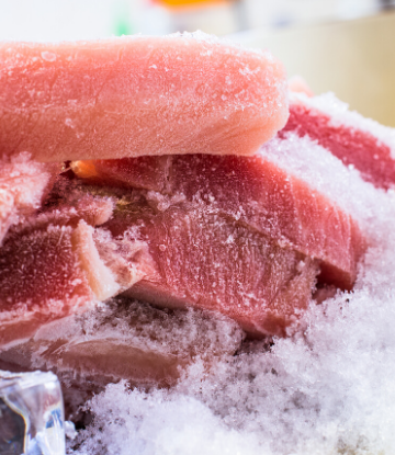 SCS, image of frozen meat cutlets on ice 