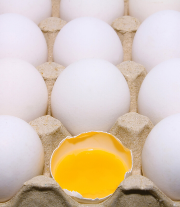 SCS, image of whole fresh eggs with one broken in half showing the yolk