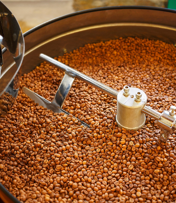 Image of coffee beans in a roaster 