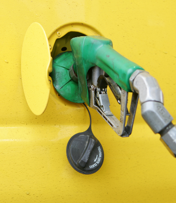 Image of diesel being pumped in to the side of a vehicle 