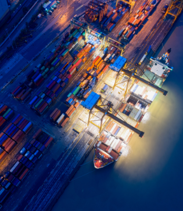 Overhead image of a container ship at port 