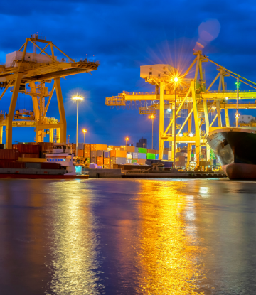 Image of a shipping port at sunset 