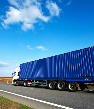 Image of a freight truck on the highway 