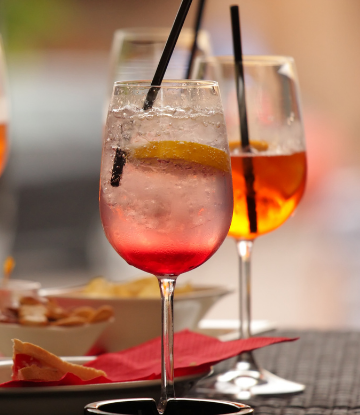 Image of drink glasses at a bar 