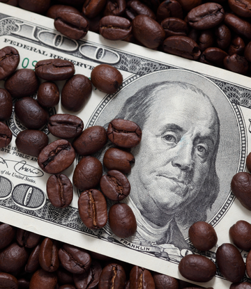 $100 bill with coffee beans on it 