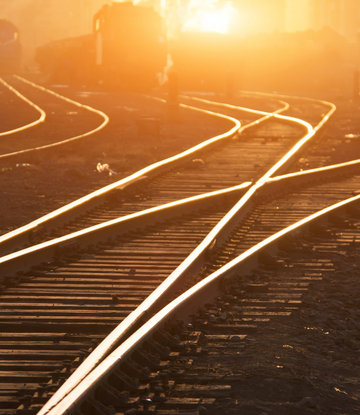 railroad tracks at sunset