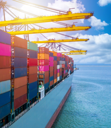 shipping containers stacked, on a ship 